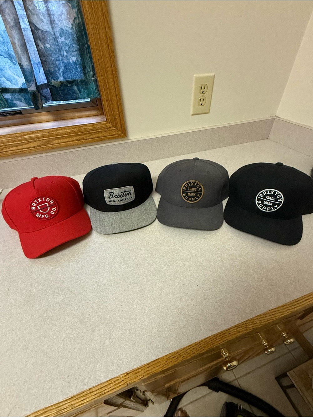 Brixton Men's Red and Black Logo Snapback Hats (Set of 4)